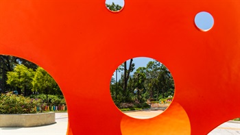 Fun views of the park are formed by voids in the play structure.
